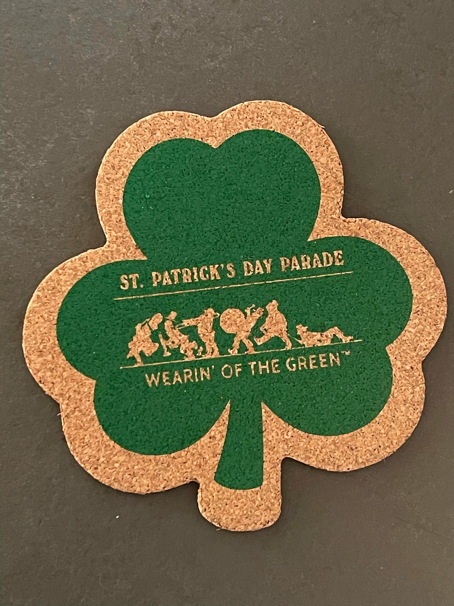 Single shamrock coaster with St. Patrick's Day design on it.