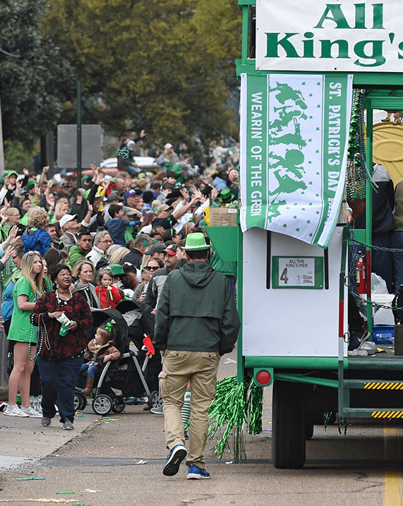 St Patrick's Day parade flag on the back of a krewe float called All the King's Men.