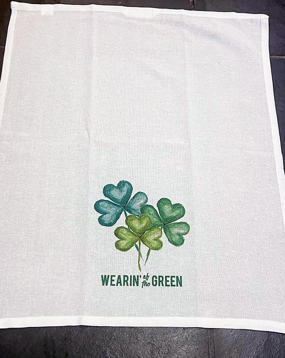 Three Shamrocks kitchen towel opened up to show size