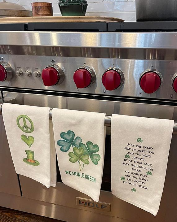 Three St. Patrick's Day themed kitchen towels.